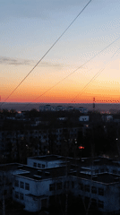 Dramatic sunset illuminates Chaikovsky, Russia skyline at dusk