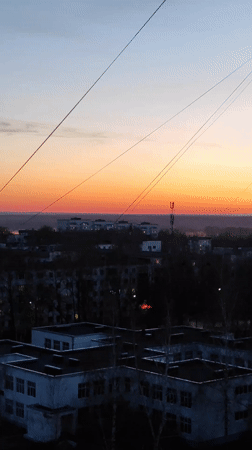 Dramatic sunset illuminates Chaikovsky, Russia skyline at dusk