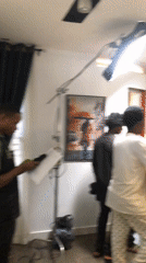 Film crew conducts indoor video production session