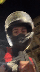 Masked motorcyclist spotted with Kennedy cap in Buenos Aires