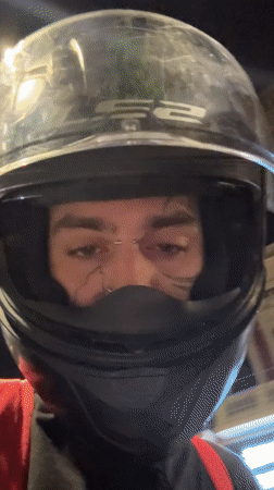 Masked motorcyclist spotted with Kennedy cap in Buenos Aires