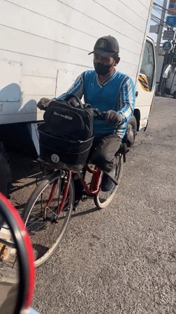 Mixed traffic flows through East Java road corridor on busy morning