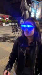 Woman walks through Yerevan city center at night