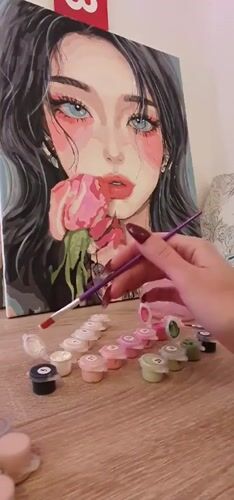 Artist works on paint-by-numbers portrait in Bar, Montenegro
