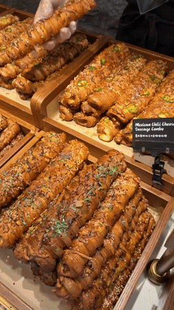 Bakery display and electric scooters captured in Chongqing