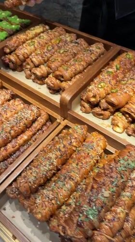 Bakery display and electric scooters captured in Chongqing