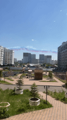 Sunny morning park scene documented in Astana, Kazakhstan