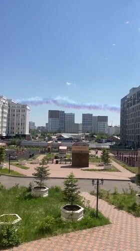 Sunny morning park scene documented in Astana, Kazakhstan