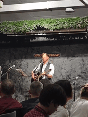 Acoustic musician performs evening show in Chaikovsky, Russia