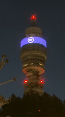London nightlife captured: BT Tower illuminated, street dining scene