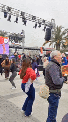 Live music and dancing at an outdoor festival in Puente Alto