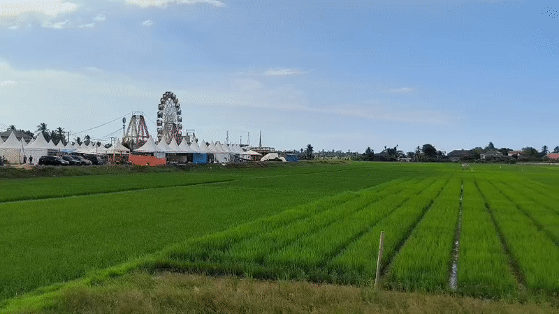 Indonesian village life documented: fairground, mosque, rice fields