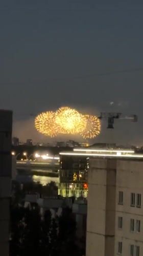 Fireworks over Saint Petersburg, scooters staged nearby