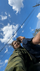 Couple rides motorcycle while filming selfies in Russia