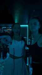 Two women dance at nightclub in Varna, Bulgaria