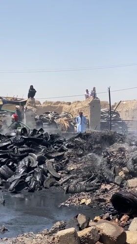 Firefighters Battle Large Tire Fire in Kandahar