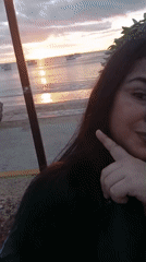 Woman documents evening coastal activities, fitness classes, sunset scenes