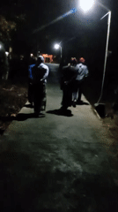 Evening walk through an Indonesian cultural or religious site with street food