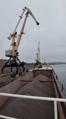 Gravel loading operations documented at Shalsky port facility