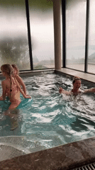 Family enjoys pool time at Montenegro mountain resort facility