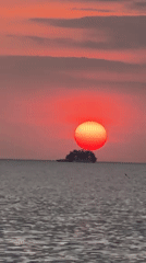 Spectacular sunset documented by witnesses at Patong Beach, Thailand