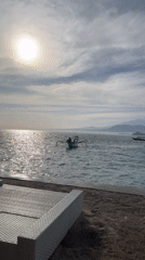 Beachfront seating and calm ocean views in Lombok
