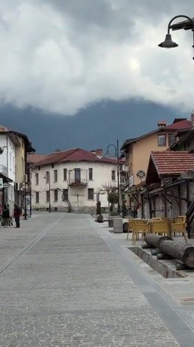 Traditional cobblestone street documented in Bansko, Bulgaria