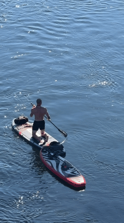 Afternoon paddleboarding on a calm river in Folsom