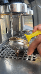 Person documented cleaning coffee equipment, sitting in car in Martil
