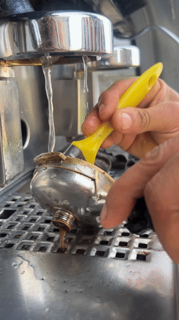 Person documented cleaning coffee equipment, sitting in car in Martil