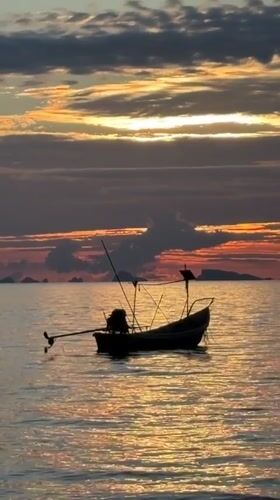 Quiet sunrise morning captured in Thai fishing village