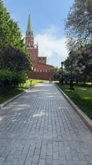 Clear day view of Moscow Kremlin pathway and tower