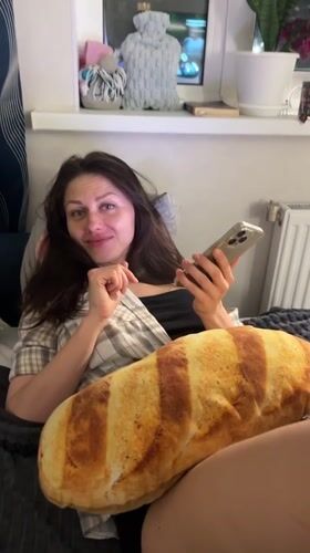 Woman documented in casual indoor moments across Murino, Russia