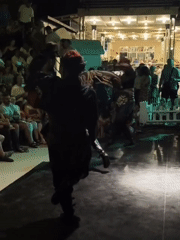 Traditional Turkish folk and belly dancing on stage in Kuşadası