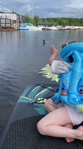 Paddleboarding a lily pad river on a sunny Chaikovsky afternoon