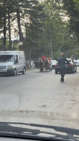 Surami, Georgia: street renovation, a carriage, and a Soviet-era monument