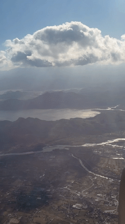 Aerial view of mountain lake captured from plane over Montenegro