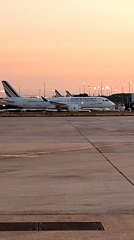 Dusk at the airport: Air France, easyJet, and DHL on the tarmac