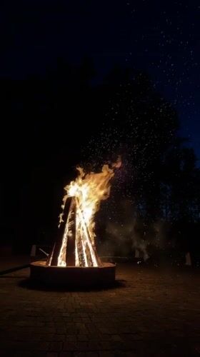 Nighttime bonfire gathering documented by witnesses in Birobidzhan, Russia
