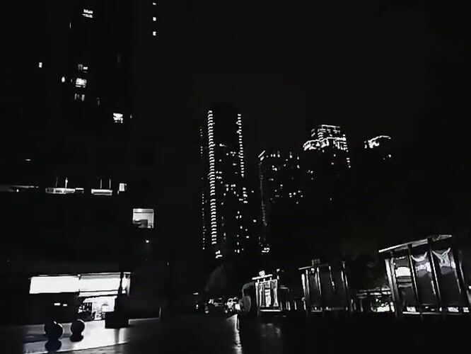 Nighttime urban scene documented in Yuzhong District public space
