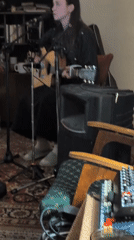 Acoustic guitar duo performs in Moscow indoor session