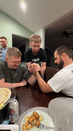 Early morning arm wrestling match observed in Carling, Canada