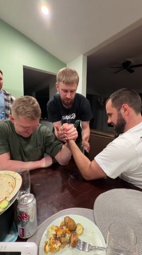 Early morning arm wrestling match observed in Carling, Canada