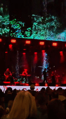 Live band concert in Estosadok against a mountain backdrop
