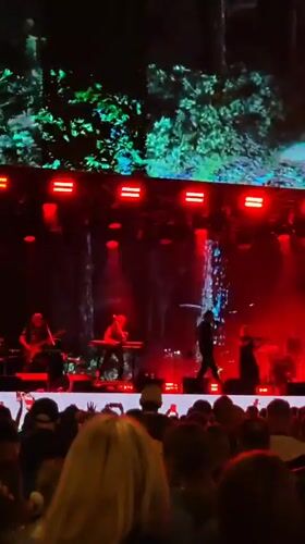Live band concert in Estosadok against a mountain backdrop