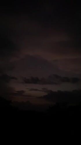 Bright object spotted through cloudy skies over Igbara, Nigeria