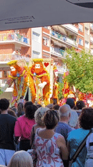 Street parade with giant puppets and floats rolls through Laredo