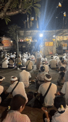 Traditional nighttime temple ceremony draws white-clad worshippers in Sukawati