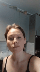 Woman's morning routine documented in Yekaterinburg apartment with cat