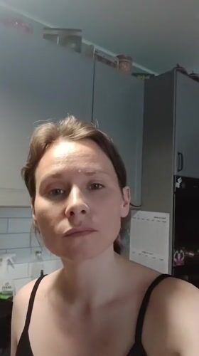 Woman's morning routine documented in Yekaterinburg apartment with cat
